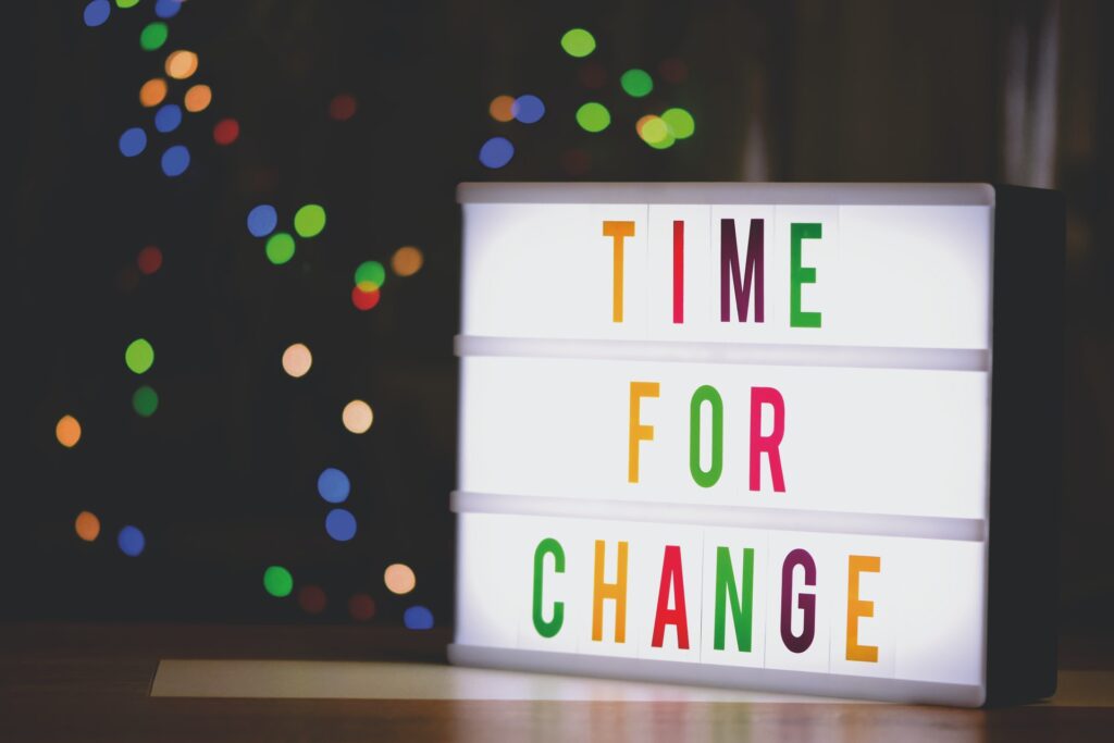 Lightboard with 'Time For Change' lettering on it