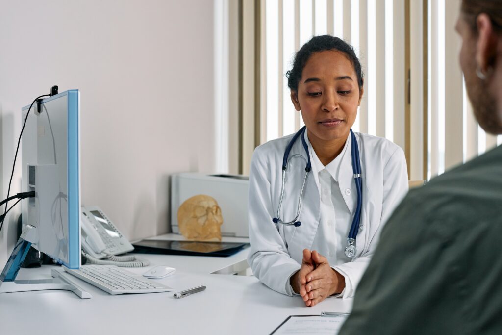 A doctor talking to her patient